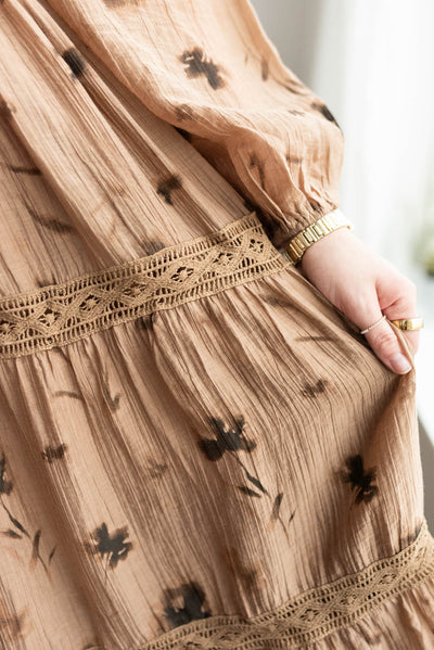 Close up of the lace on the mocha floral tiered dress