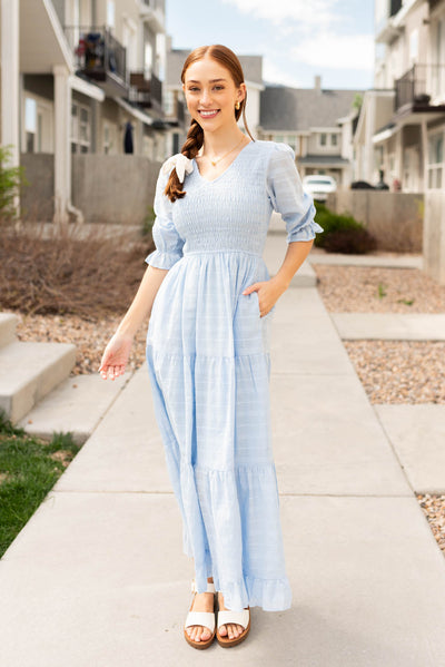 Sky blue maxi dress with pockets and smocked bodice