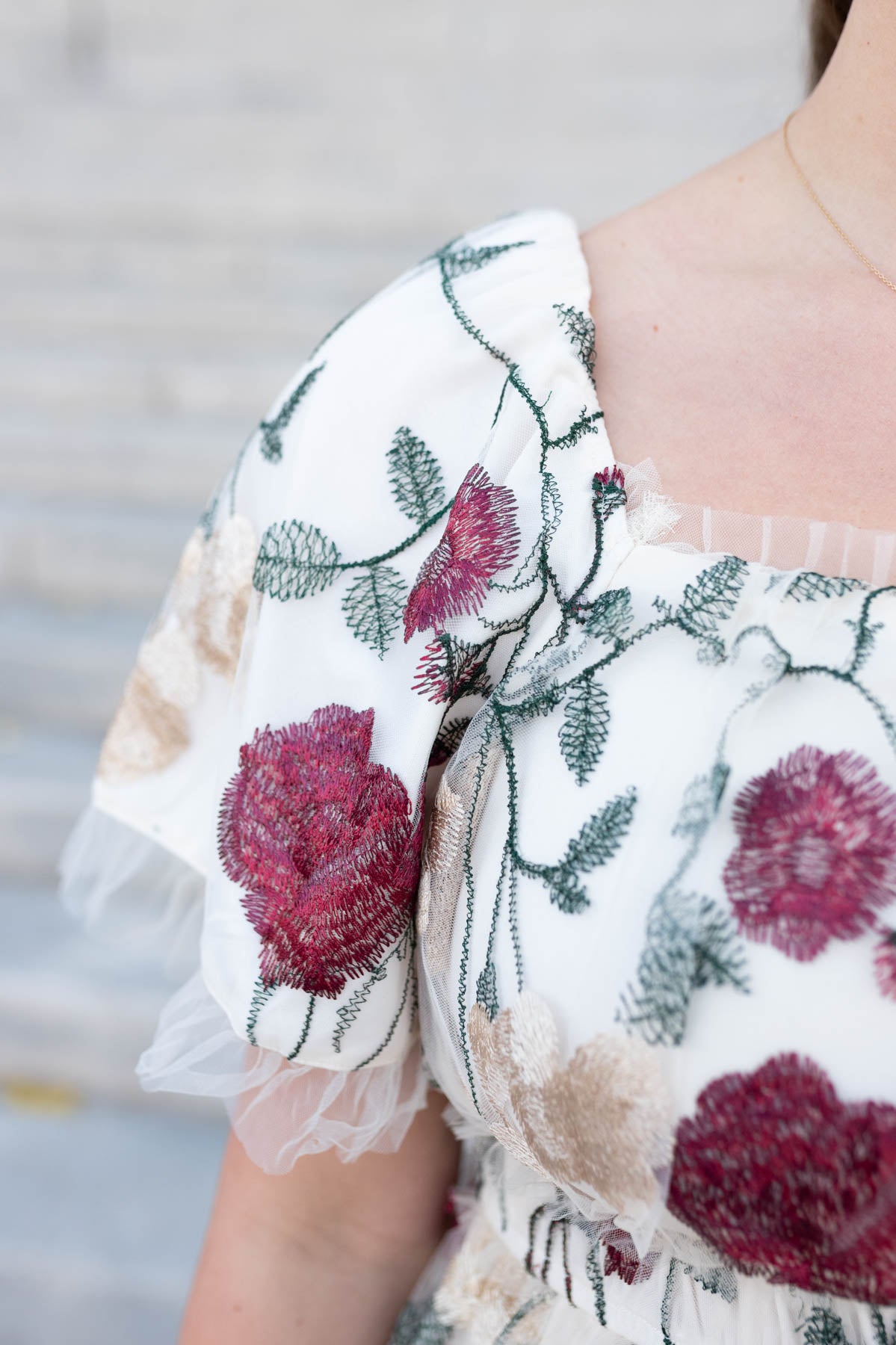 Close up of cream floral mesh dress