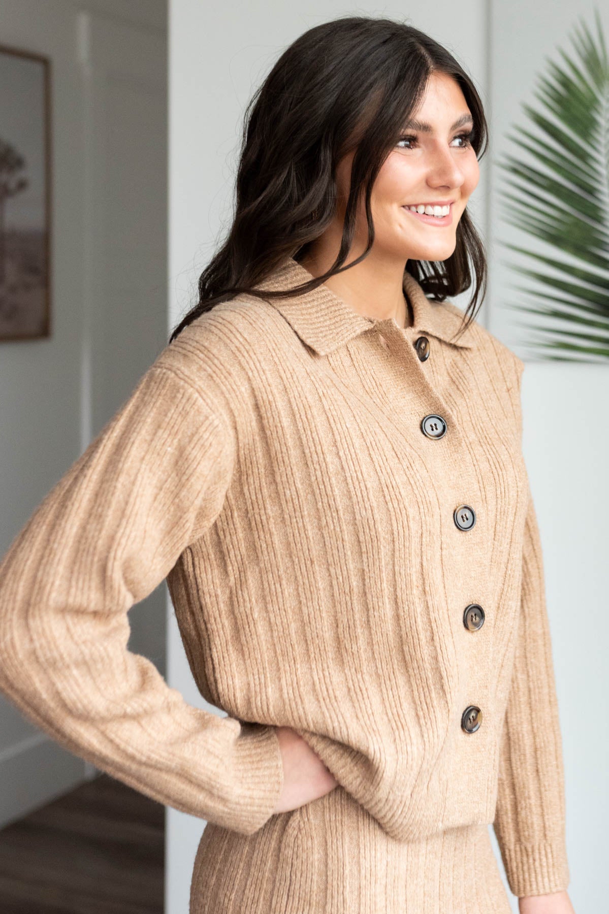 Side view of the camel ribbed sweater