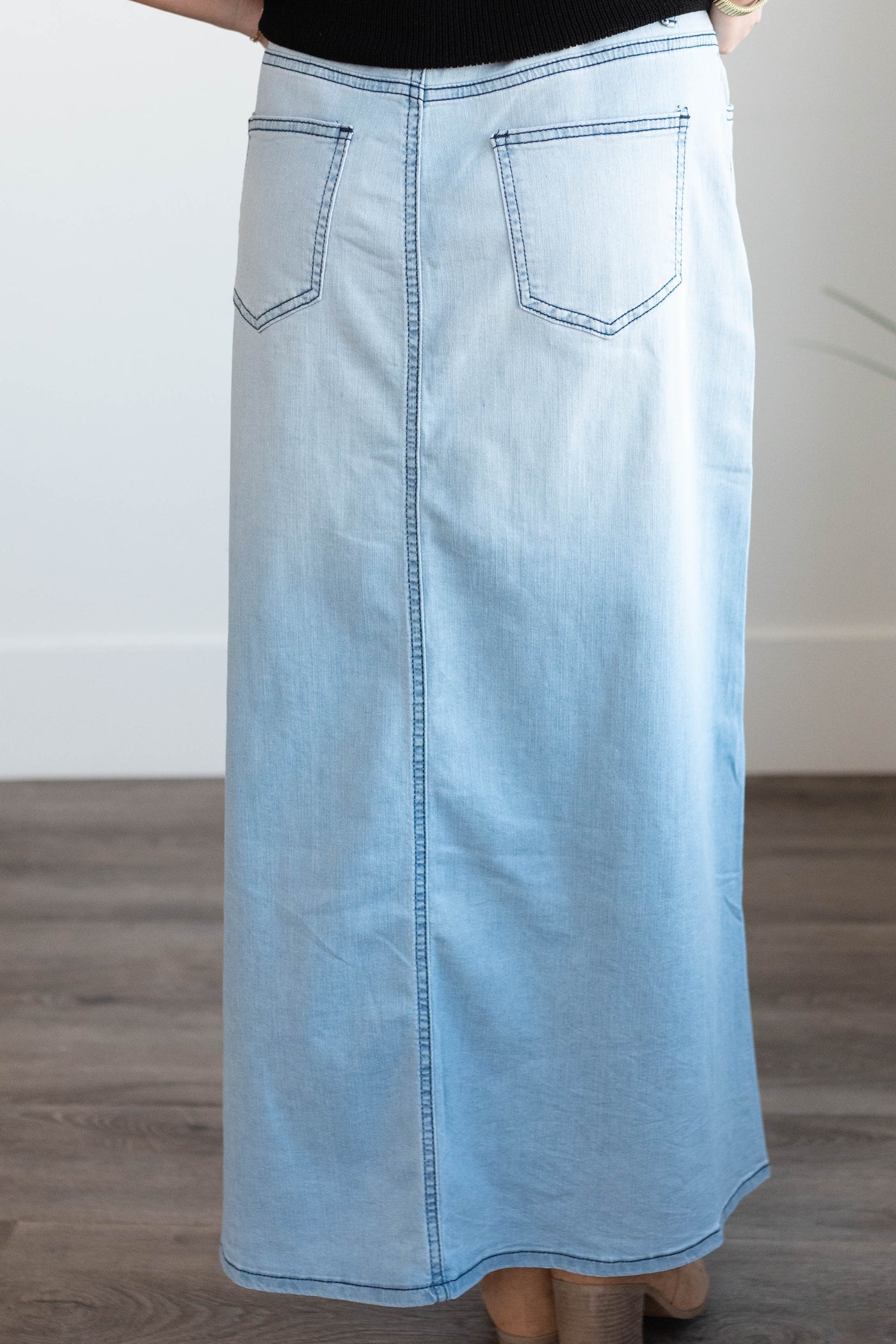 Back view of the light wash indigo denim skirt