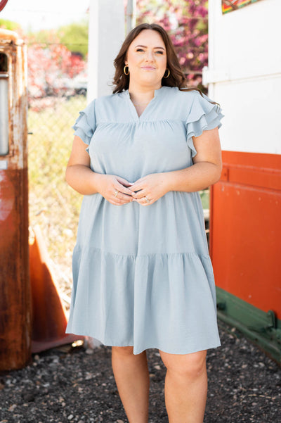  Plus size blue dress with tiers and ruffles on sleeves