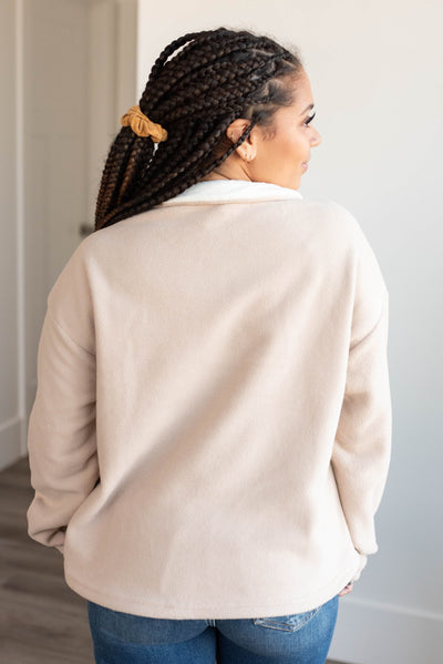 Back view of the taupe half zip pullover