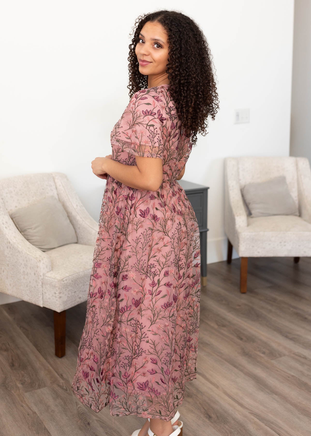 Side view of the antique pink embroidered dress