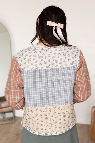 Back view of the ivory pattern block jacket 