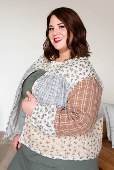 Side view of the ivory pattern block jacket in plus size