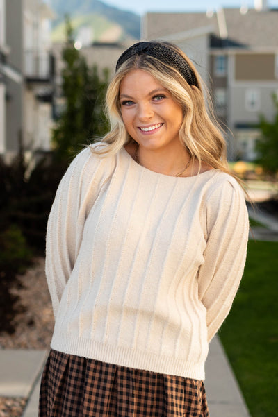 Long sleeve taupe sweater with a ribbed sweater stripe