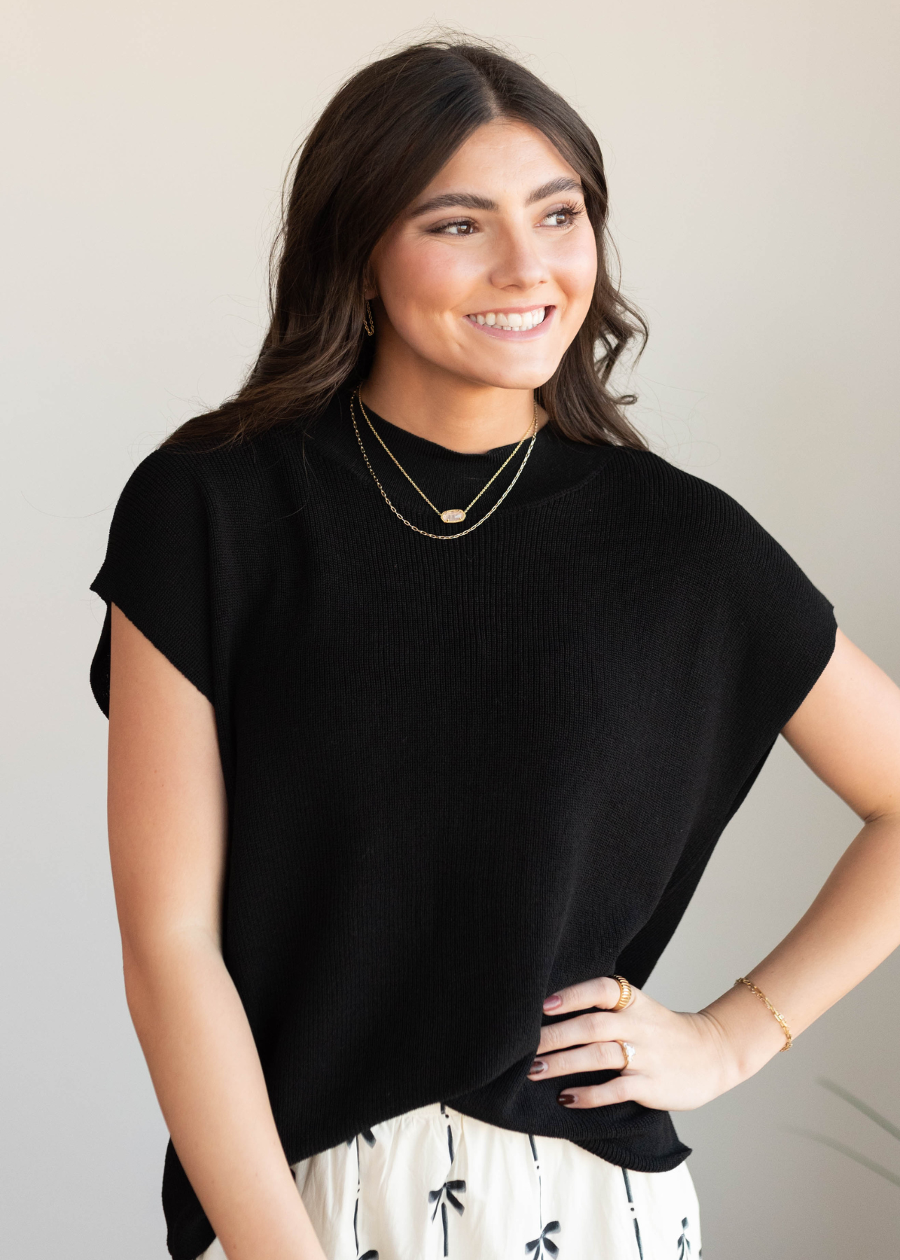 Black cap sleeve sweater top with short sleeves