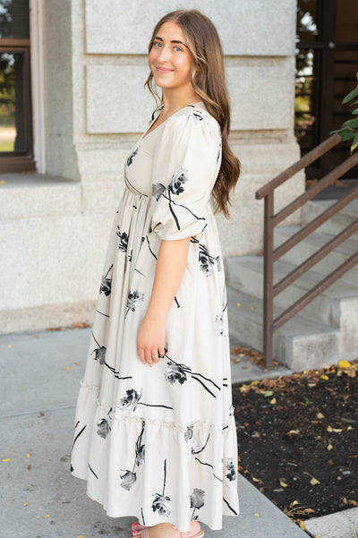 Side view of the beige floral dress