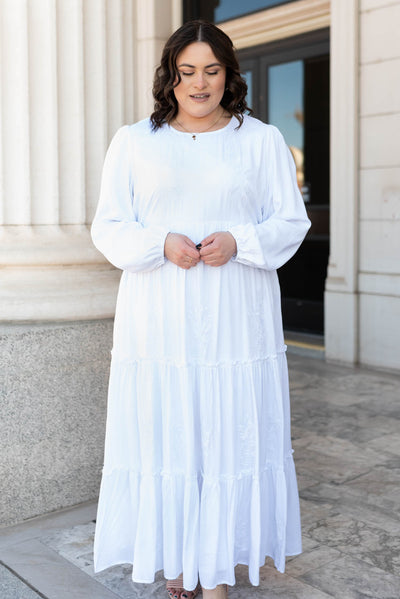 White embroidered dress with tiered skirt