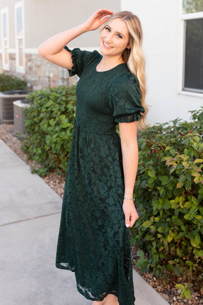 Side view of the emerald green lace dress