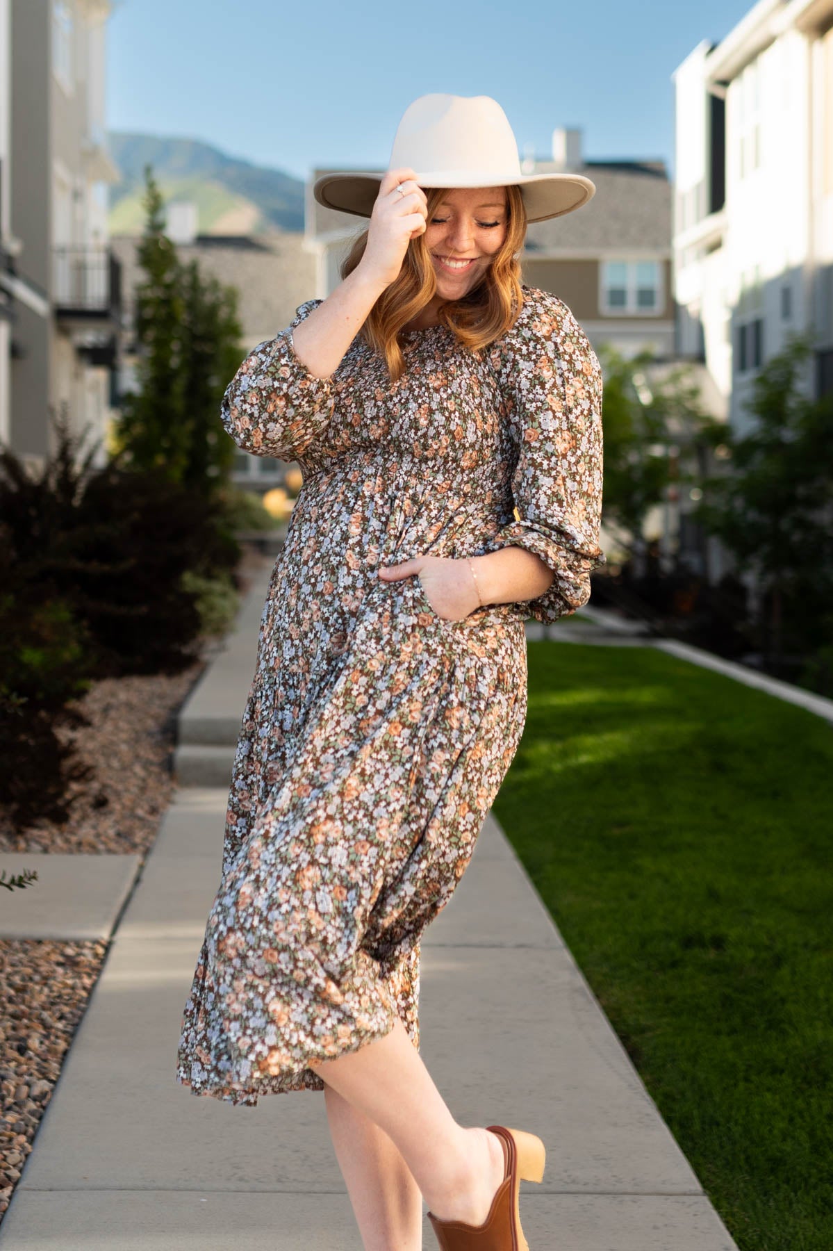 Chestnut floral dress with a smocked bodice