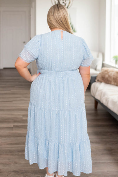 Back view of the plus size light blue lace dress