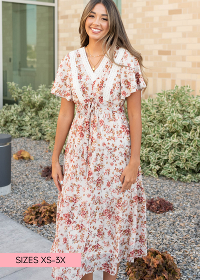 Cream floral tiered dress with lace on the bodice