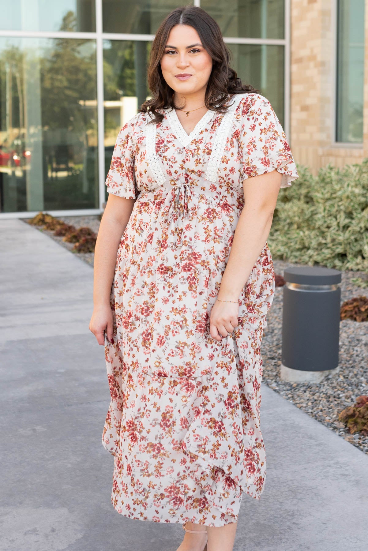 Plus size cream floral tiered dress with ruffle sleeves