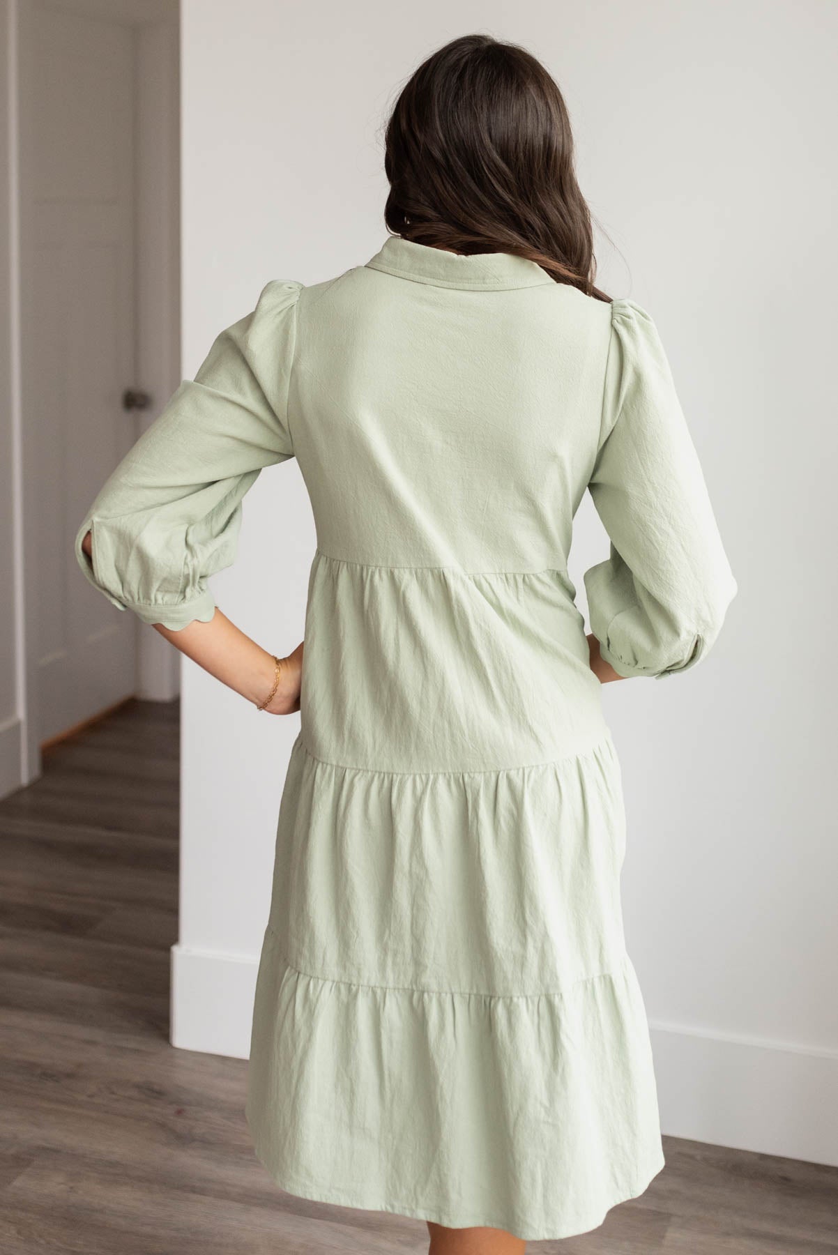 Back view of the green button down dress