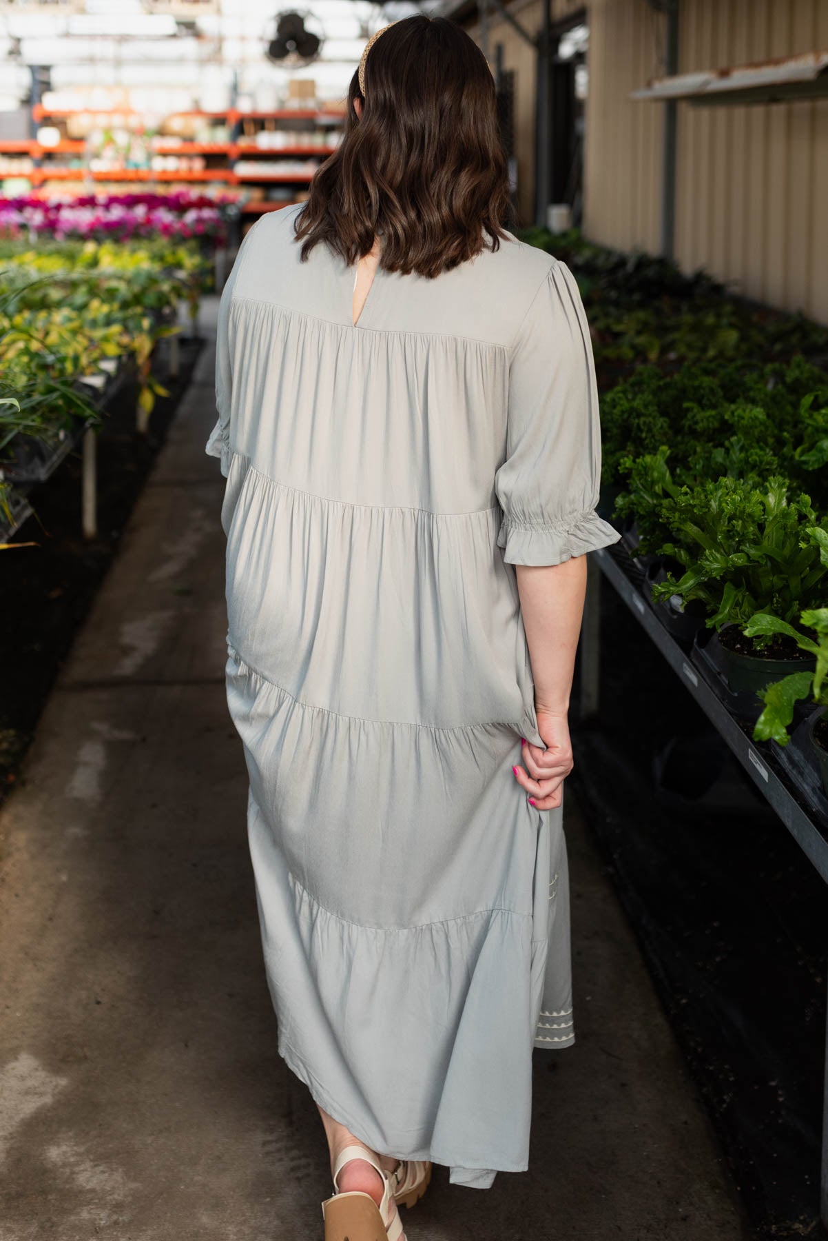 Back view of the cool jade embroidered tiered dress