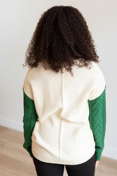 Back view of the green color block sweater