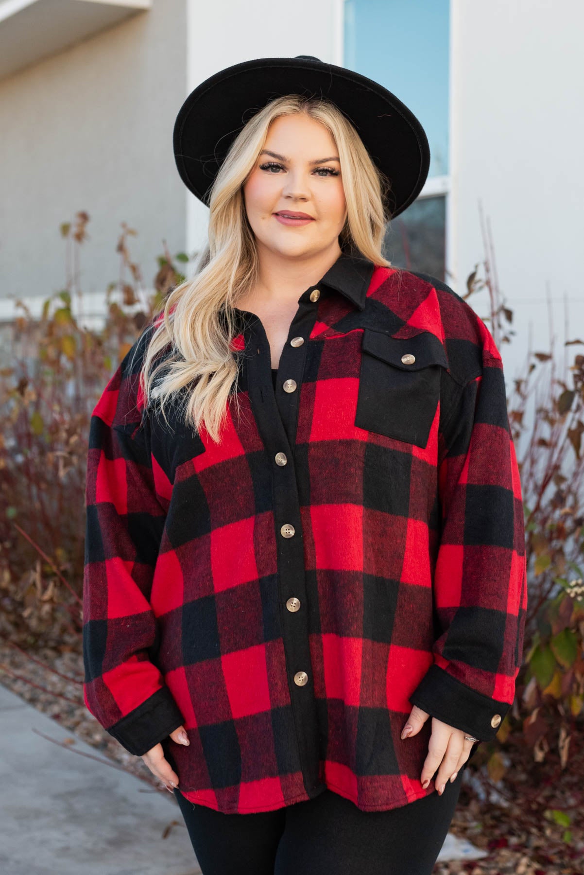 Buffalo check top with black pockets on the front