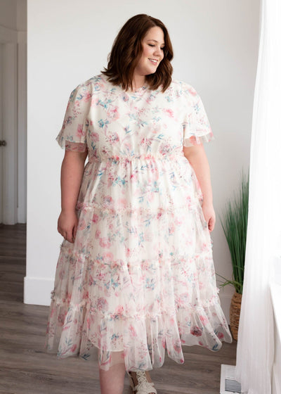 PInk floral mesh dress with a tiered skirt in plus size