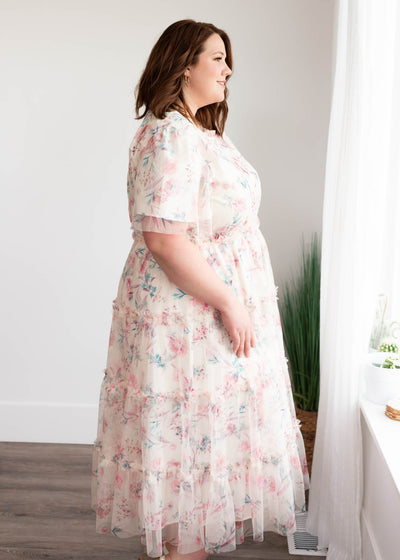 Side view of the plus size pink floral mesh dress