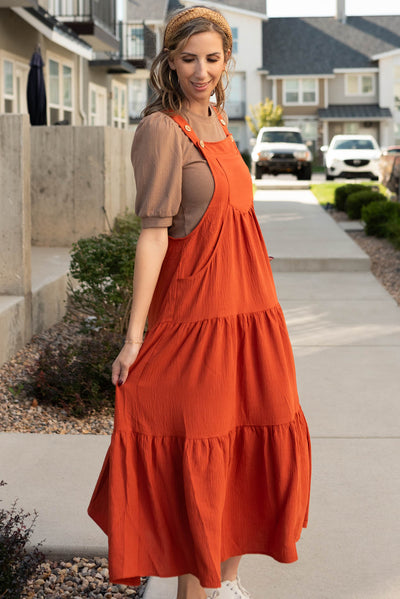 Side view of the rust overall dress