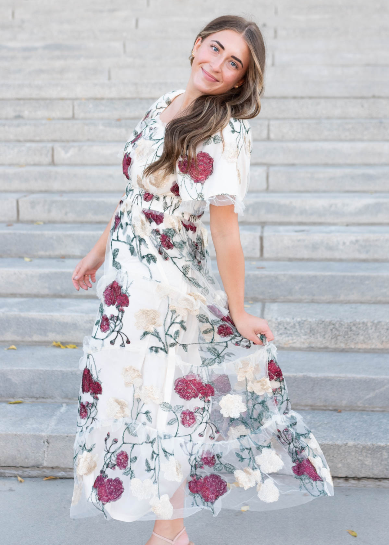 Side view of the cream floral mesh dress