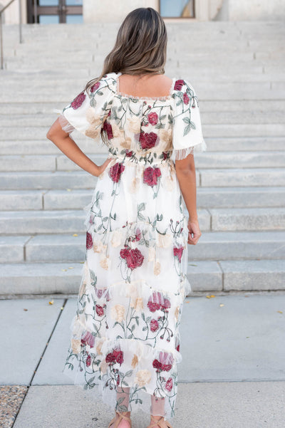 Back view of the cream floral mesh dress