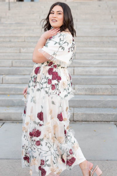 Side view of the cream floral mesh dress