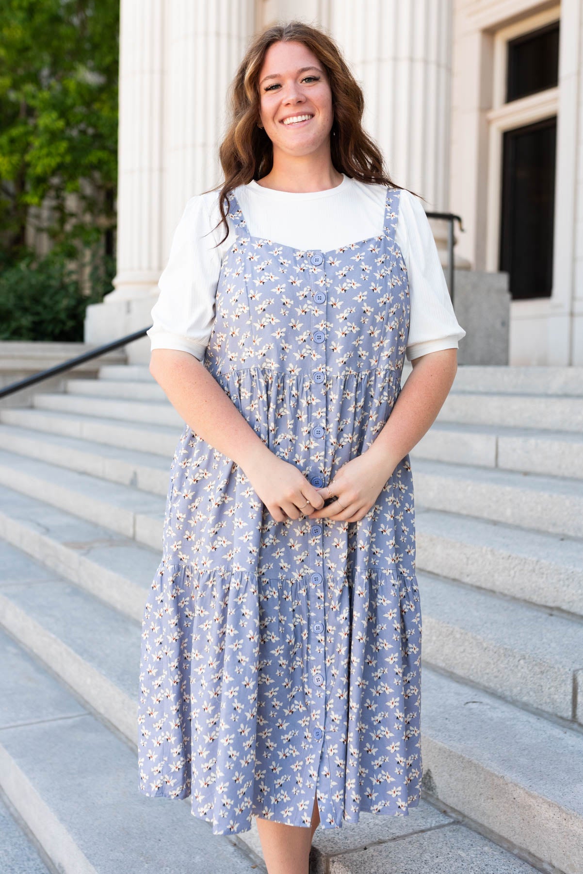 Front view of the plus size dusty blue jumper dress