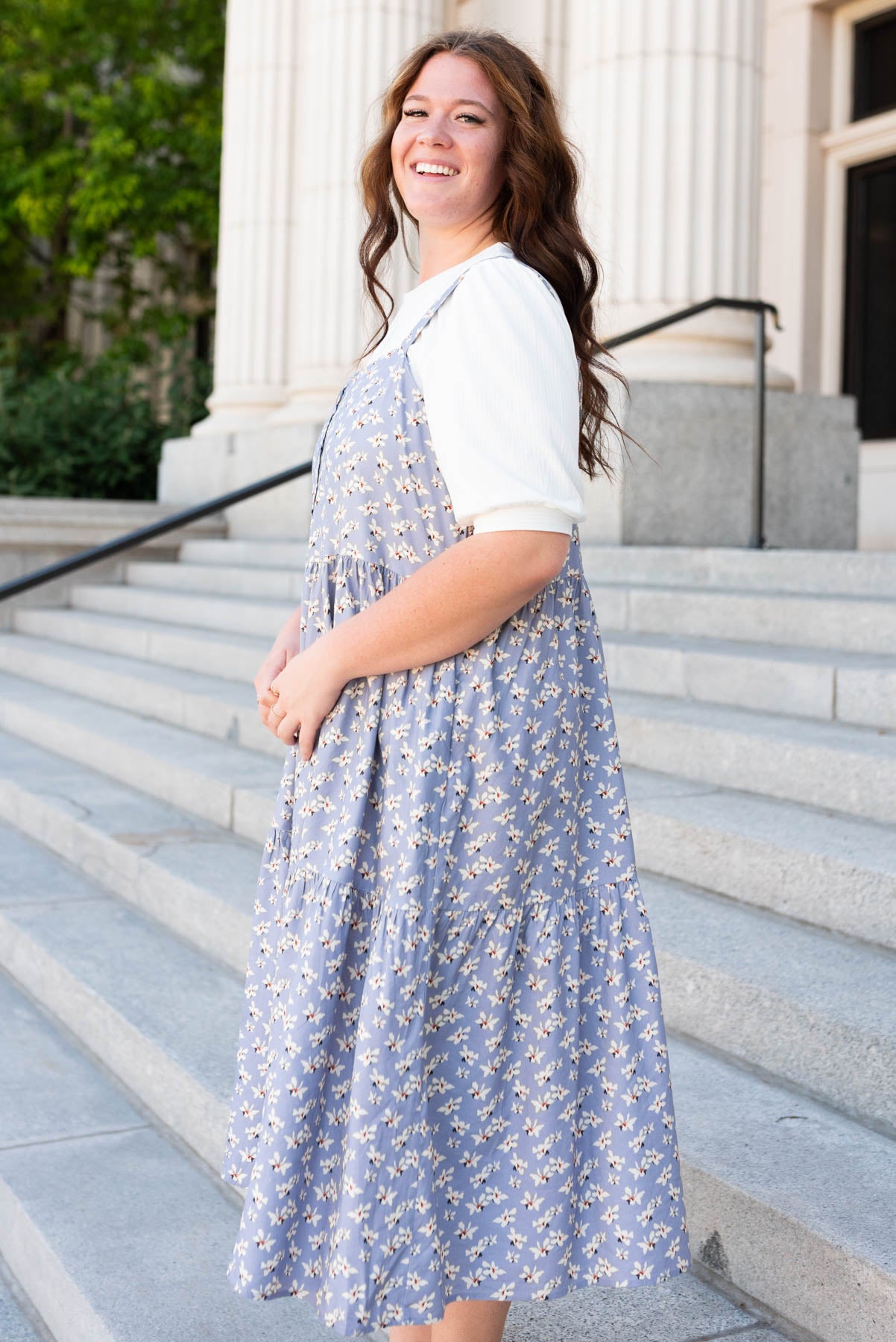 Side view of the plus size dusty blue jumper dress