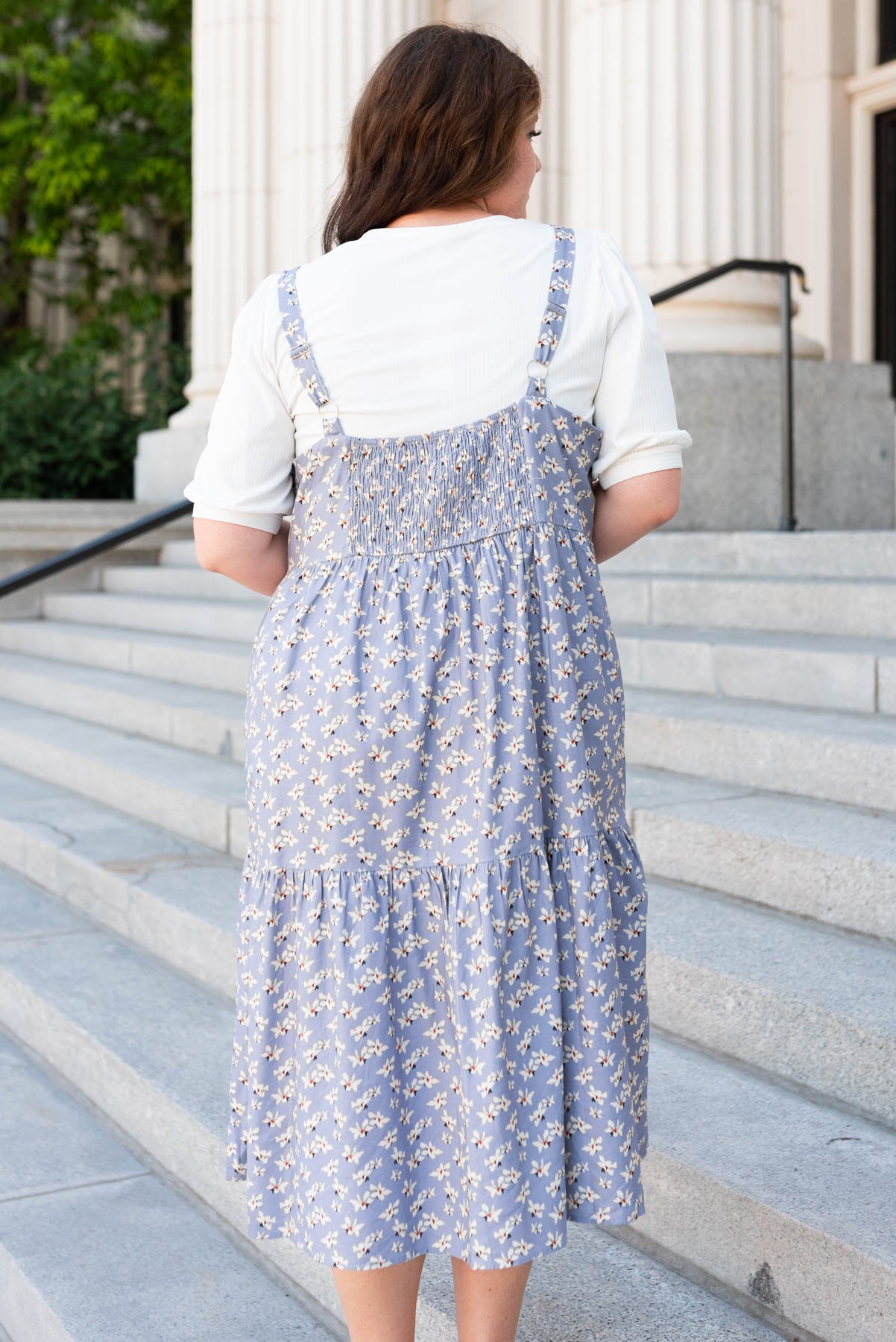 Back view of the plus size dusty blue jumper dress