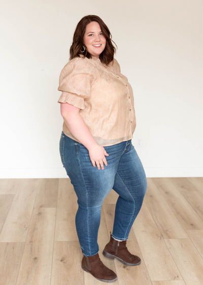 Side view of the plus size taupe floral blouse