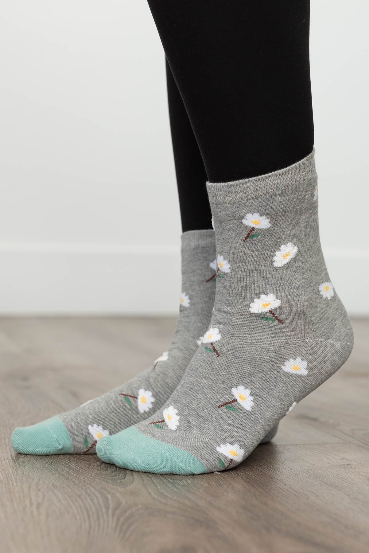 Side view of the grey daisy garden socks