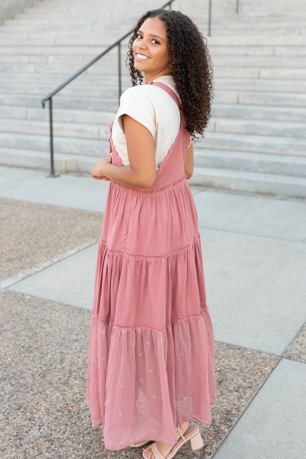 Side view of the medium desert rose overall dress