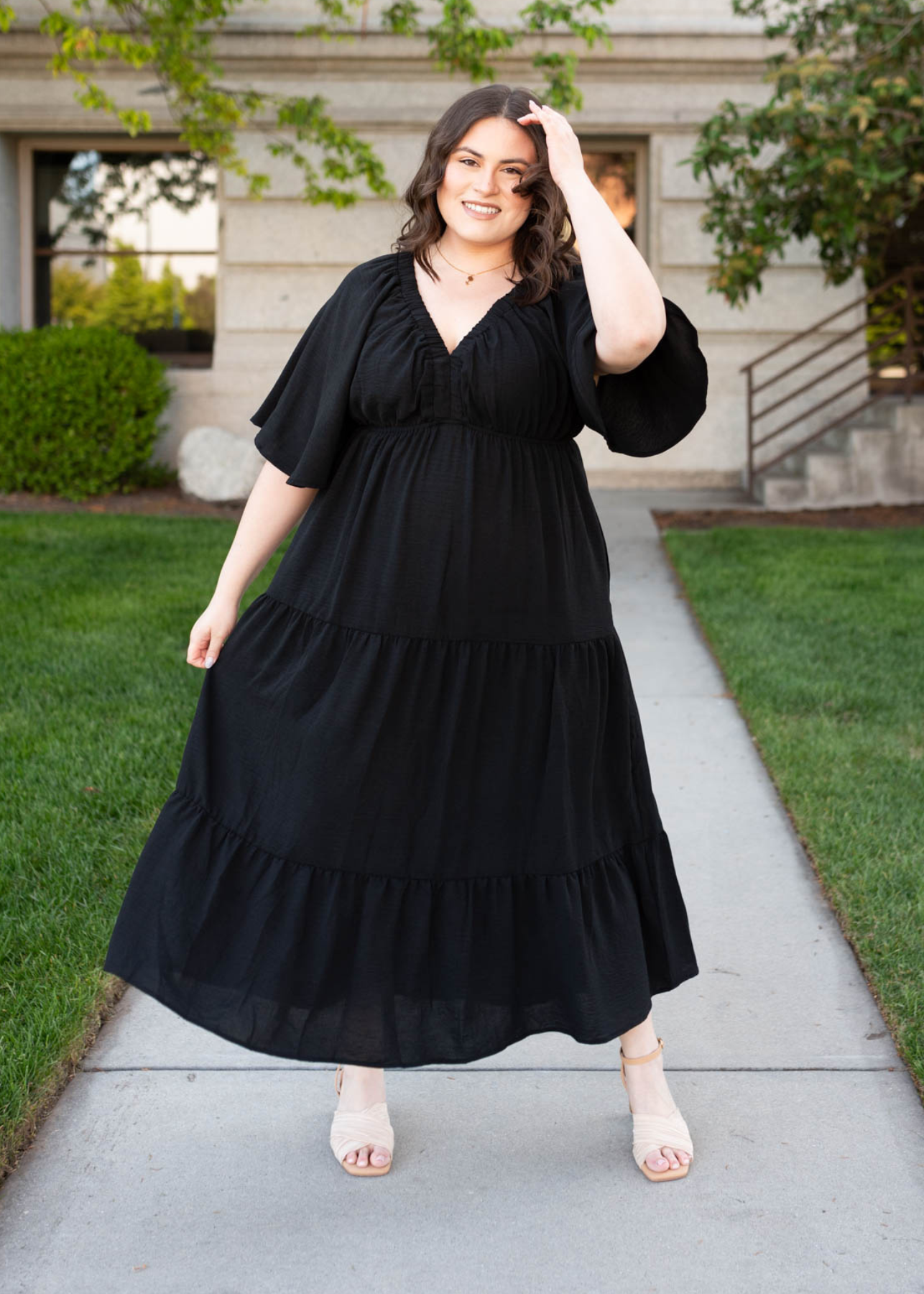 Plus size black tiered maxi dress with banding under the bust