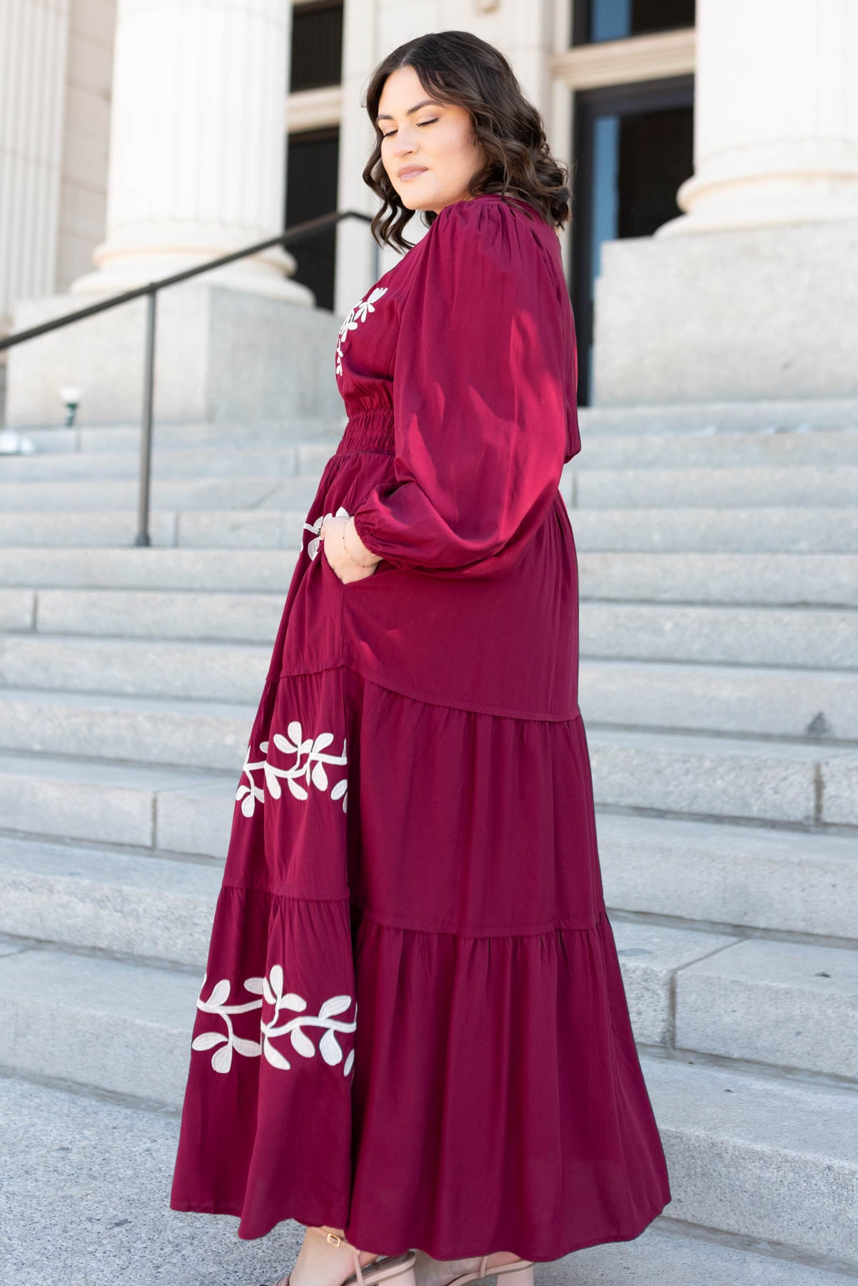 Side view of the wine floral embroidered dress with pockets