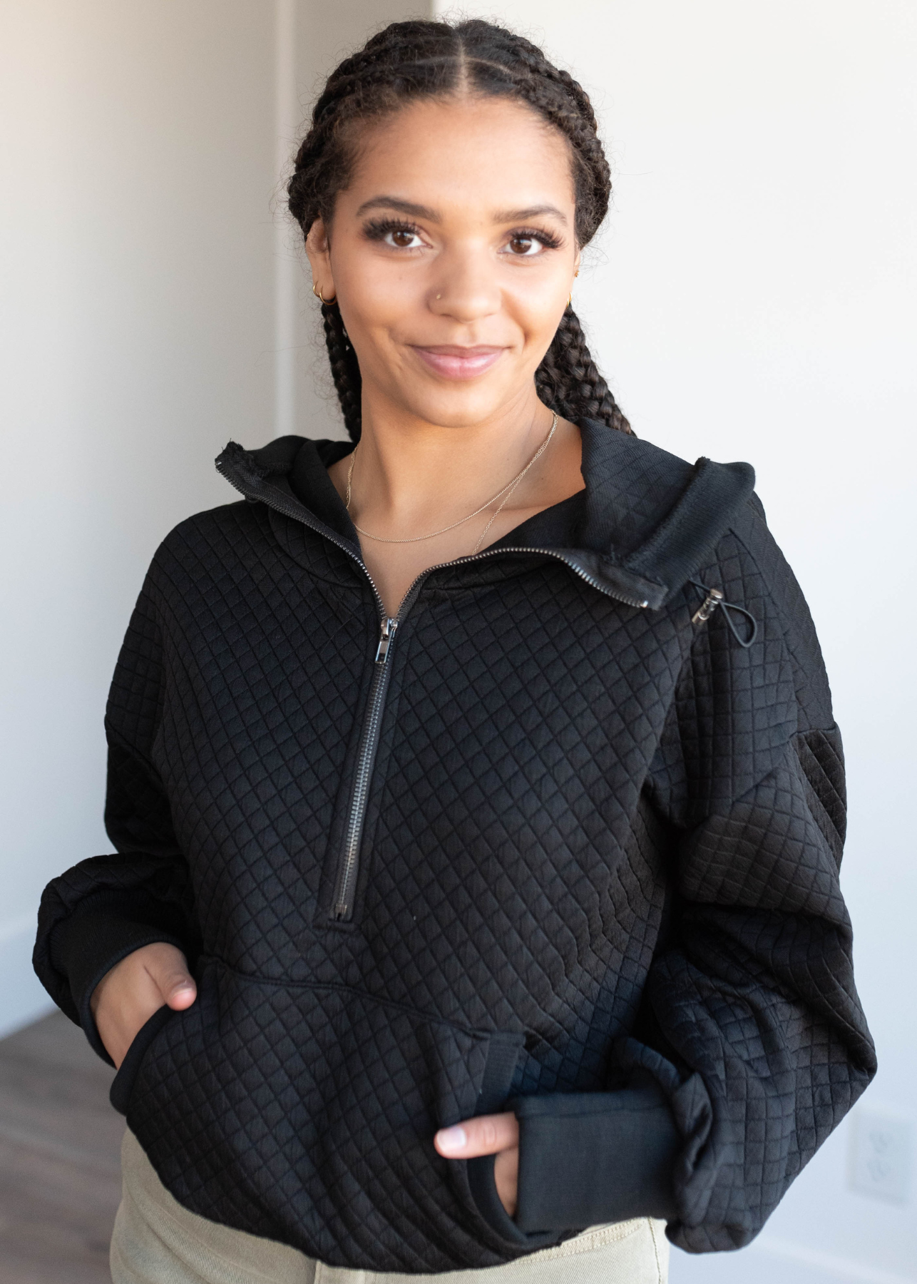 Black quilted half zip pullover