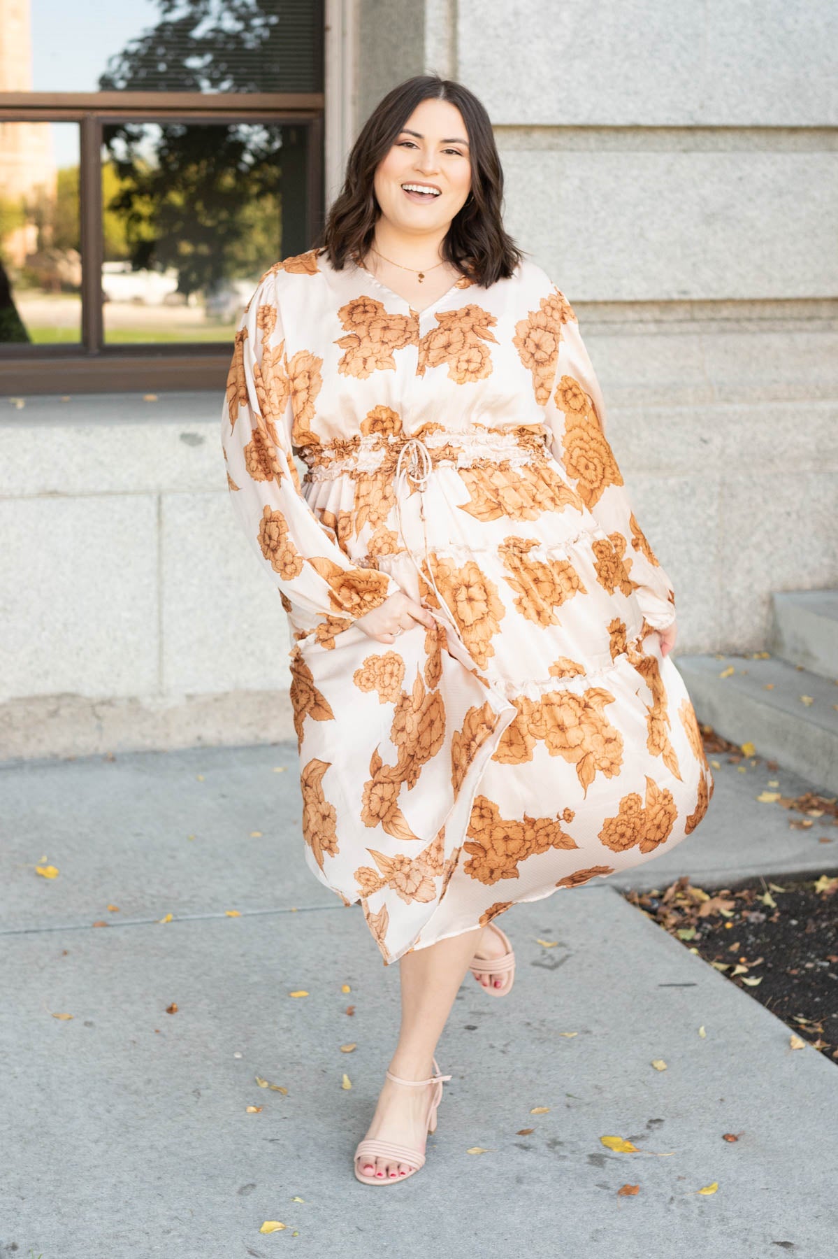 Plus size beige floral dress with long sleeves