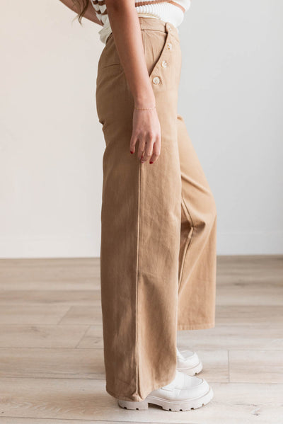 Side view of the tan wide leg pants