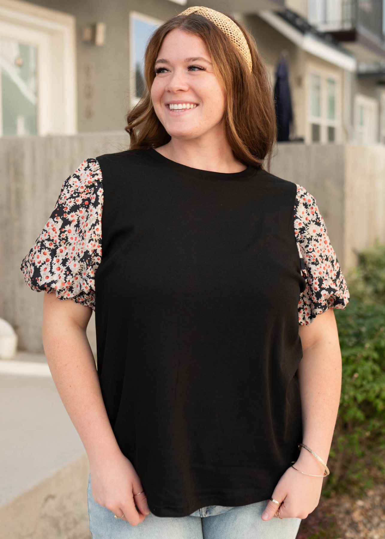 Black daisy print top with daisy sleeves