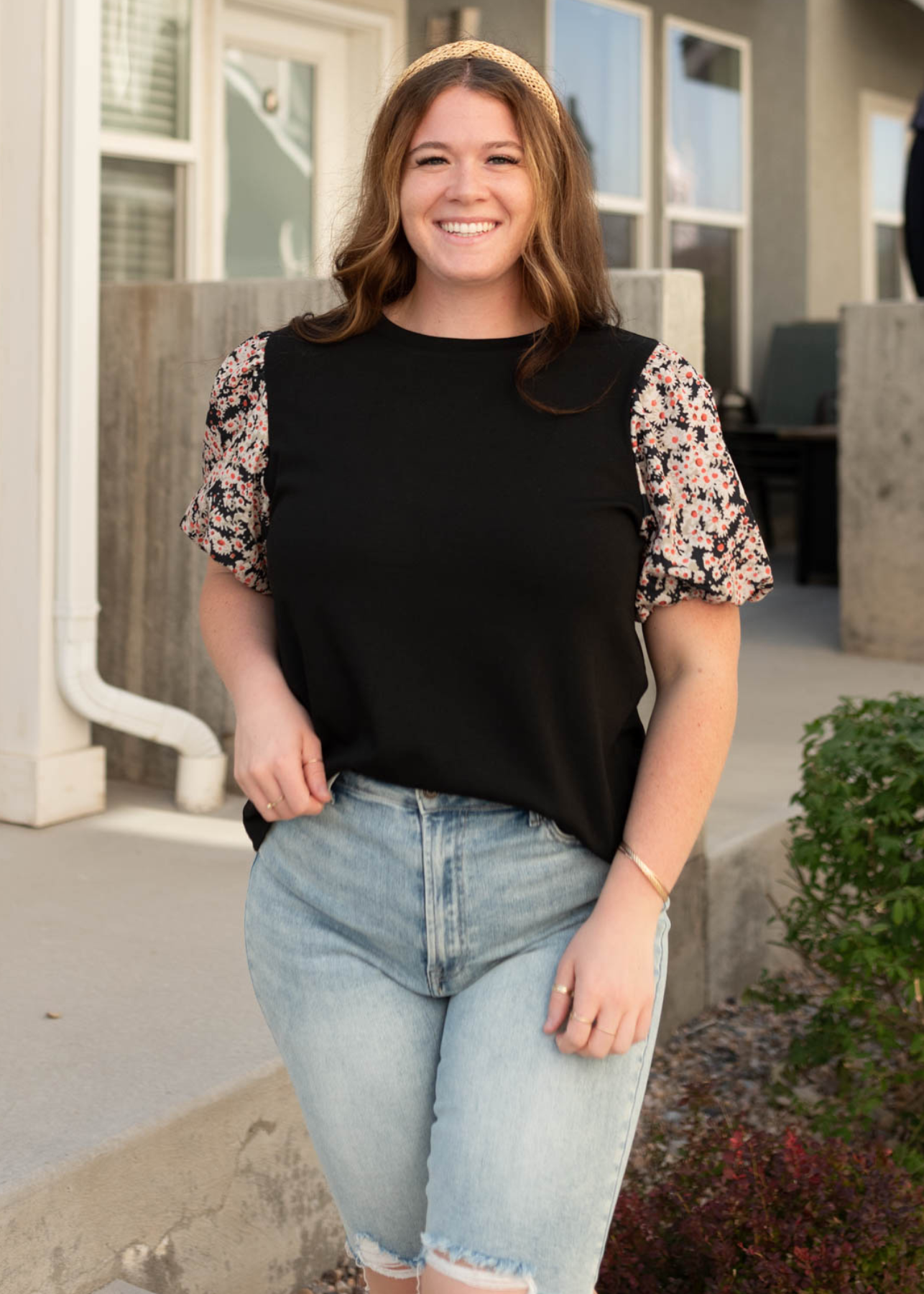 Black daisy print top