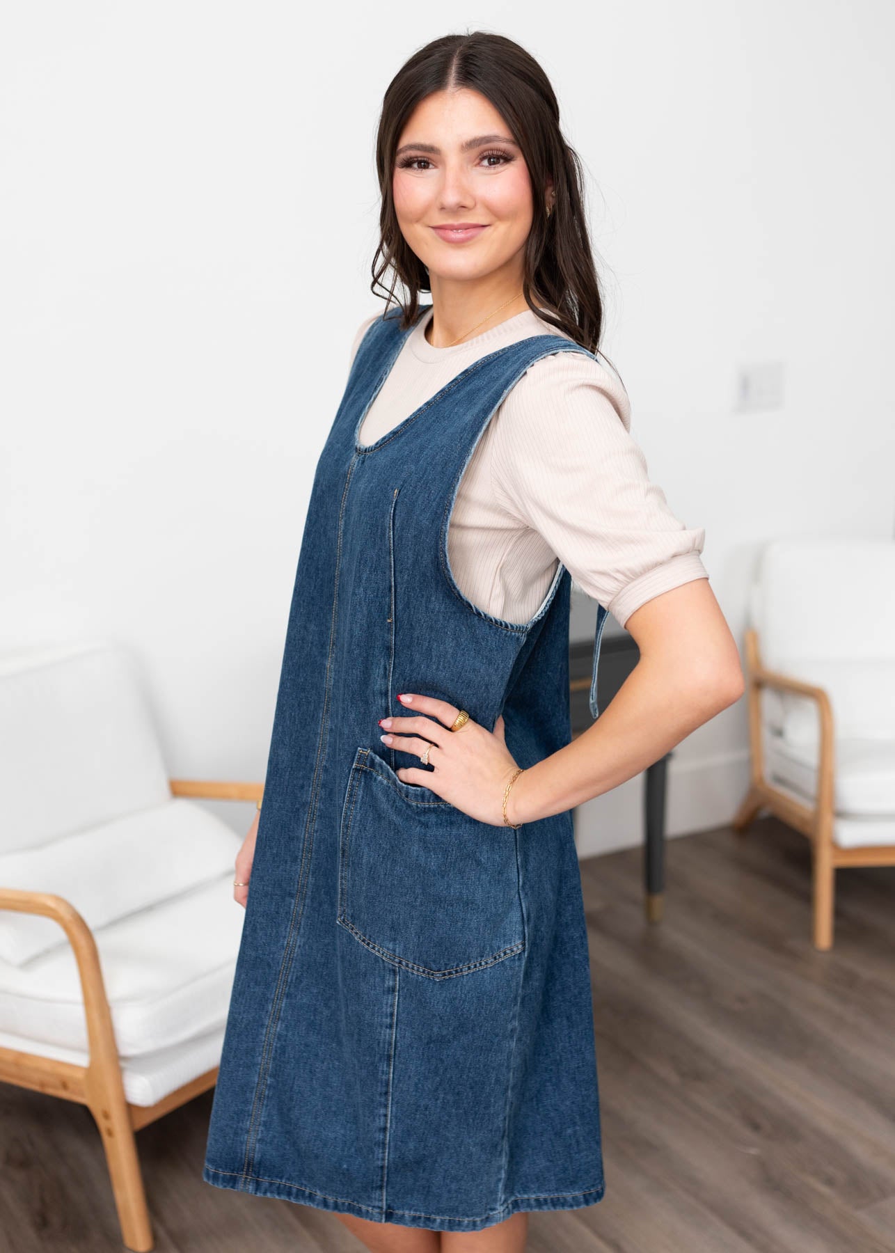 Side view of the denim overall dress