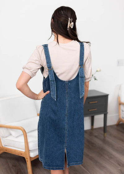 Back view of the indigo denim overall dress