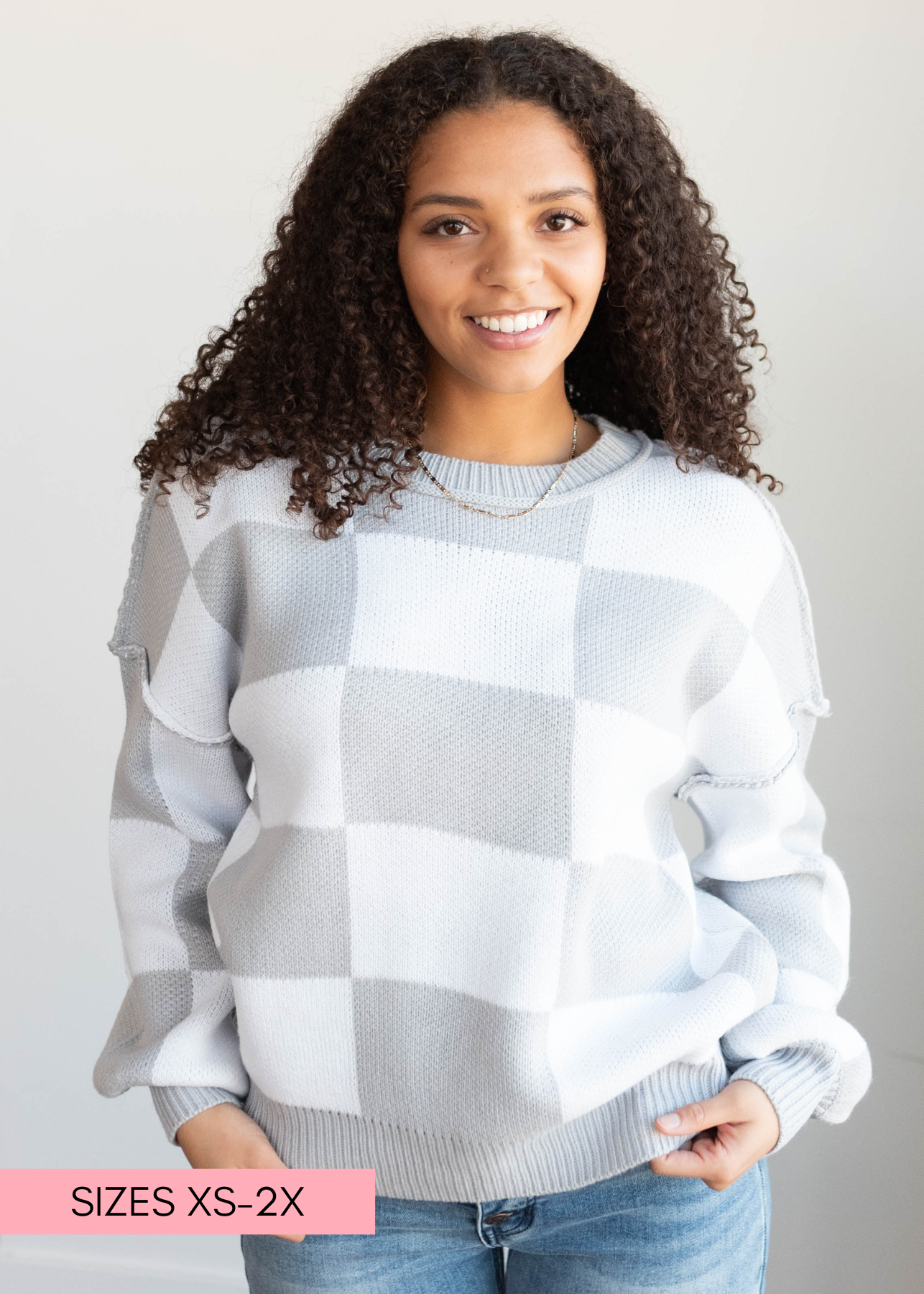 Grey checkered sweater