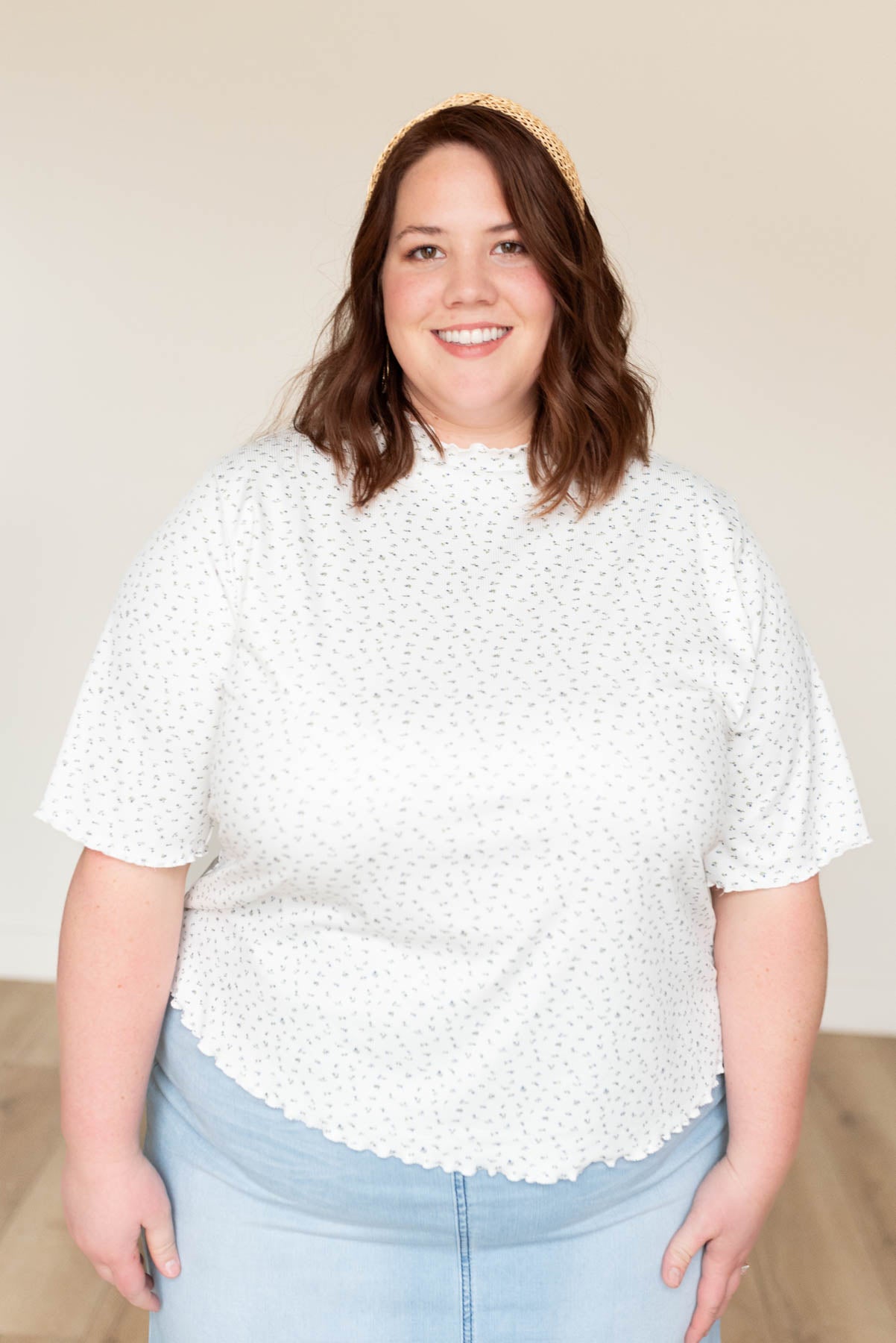 Short sleeve ivory floral ruffle top in plus size