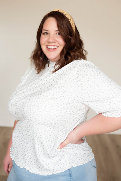 Plus size ivory floral ruffle top