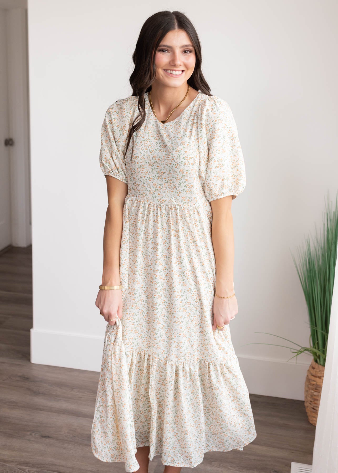 Short sleeves on the orange floral dress