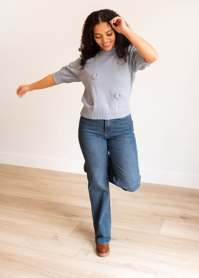 Dusty blue floral knit sweater with short sleves and wider cuffs