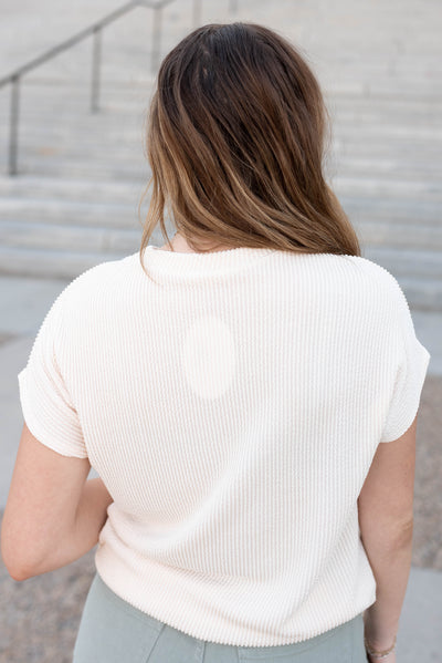 Back view of the eggshell ribbed top